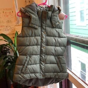 Puffy green winter vest with hood